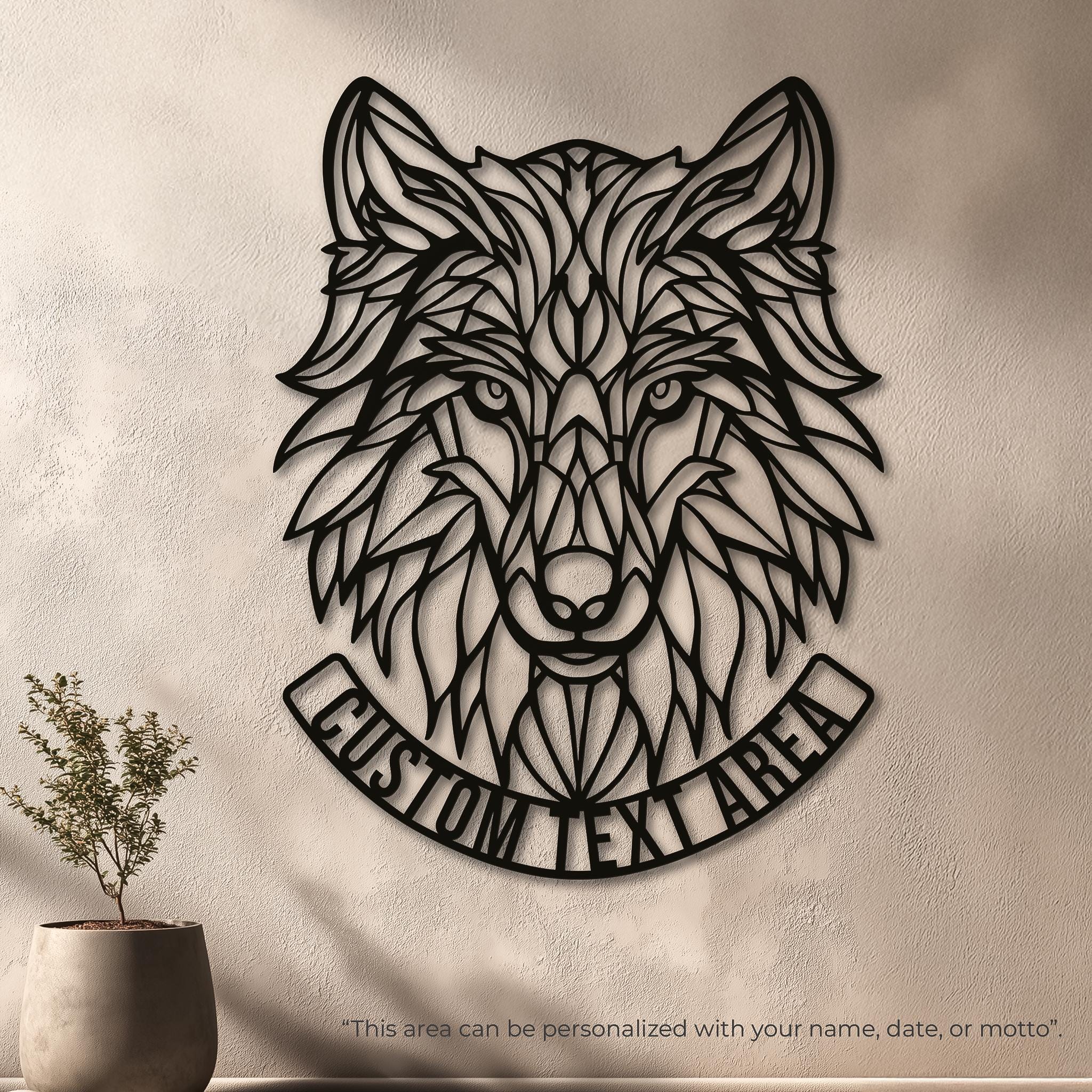 May include: Black metal wolf head wall art with geometric design. The wolf's face is detailed with intricate lines and shapes. A banner below reads "CUSTOM TEXT AREA". The text below the banner says "This area can be personalized with your name, date, or motto."