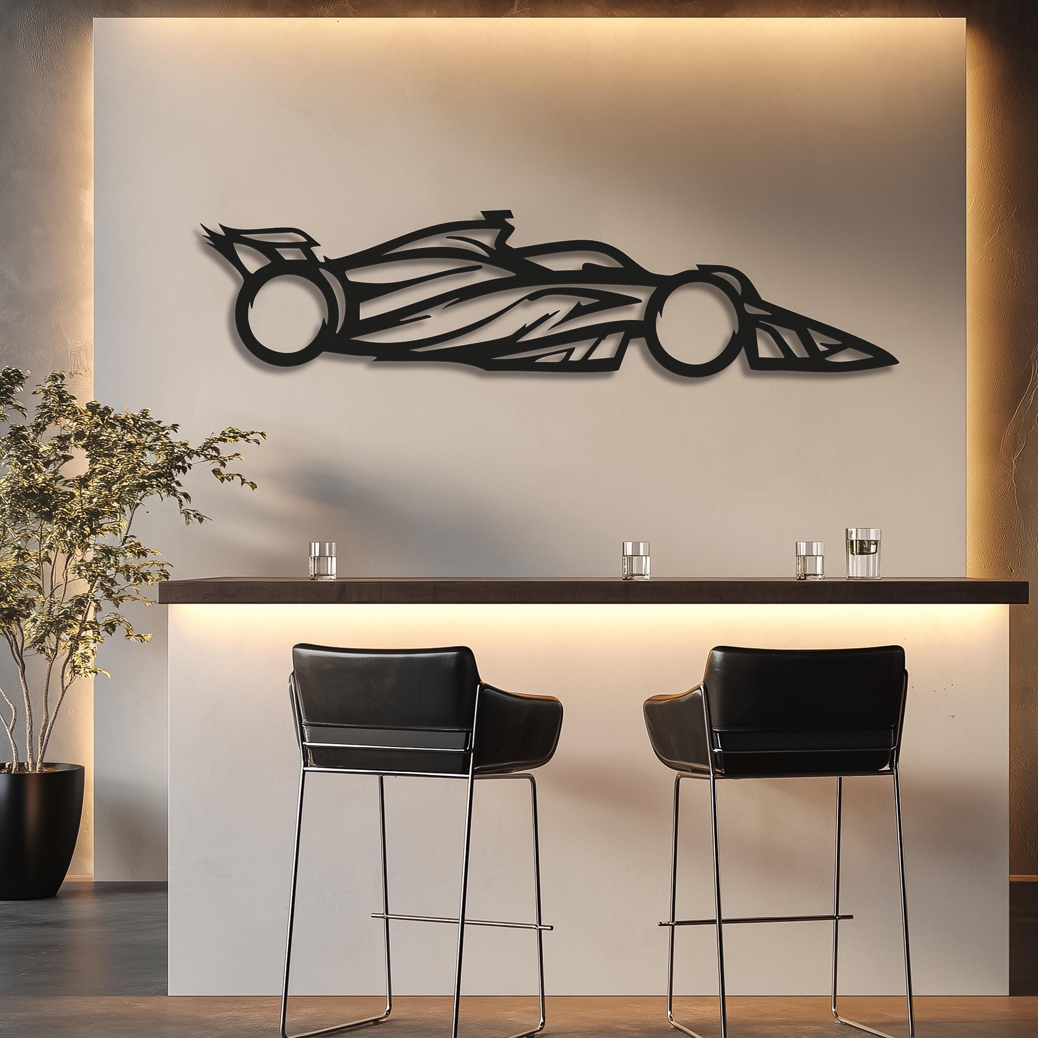 Open-wheel racing car metal wall art mounted on a backlit bar wall; matte black CNC laser-cut decor; bold focal piece for lounge, café or home bar; motorsports gift, ready to hang.