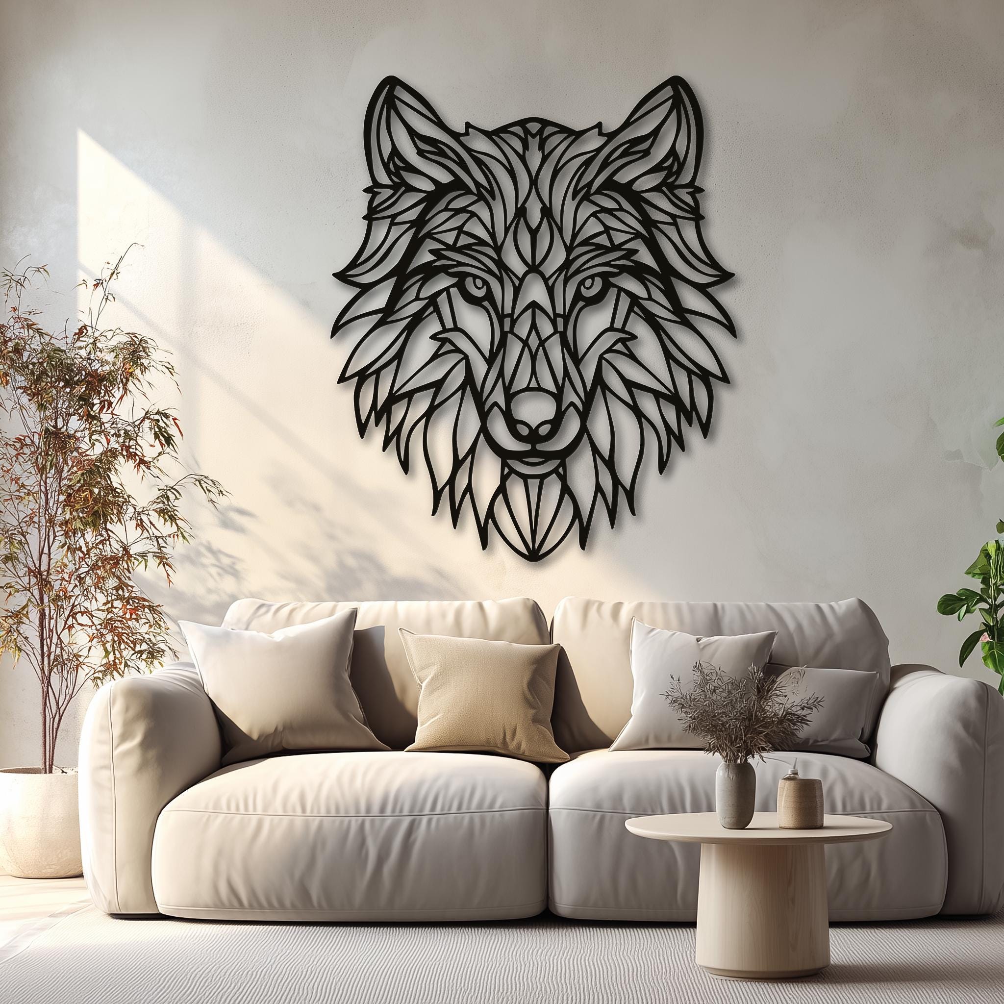 Large metal wolf head wall decor used as a focal point above a gray sofa in a spacious, modern living room. This impressive piece of art is ideal for adding depth and character to living room walls. A great housewarming gift for him.