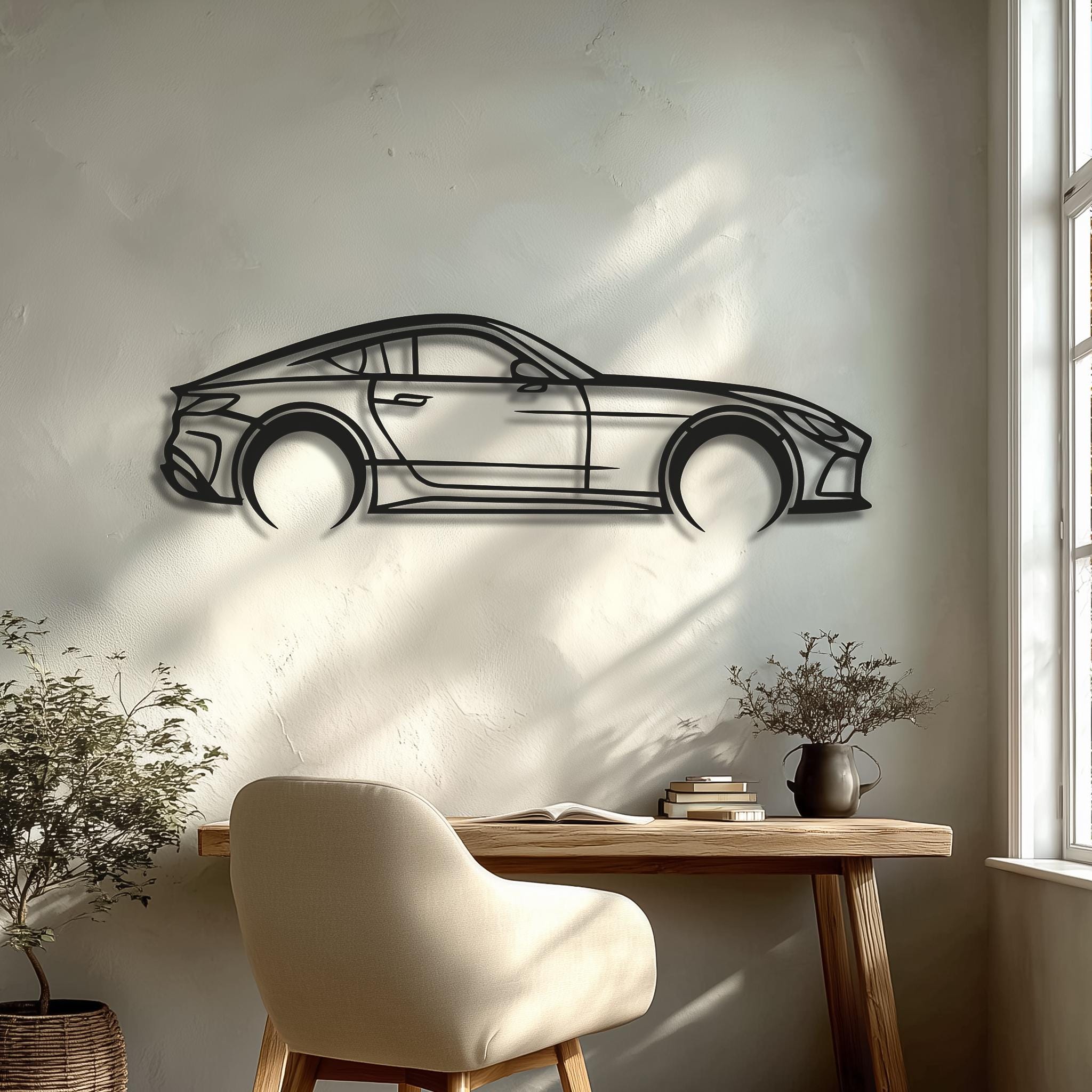 Interior mockup: sleek car metal wall art on a sunlit wall above a minimalist desk. Matte-black finish, 2 cm stand-off shadow. Premium personalized decor for office/studio; custom car silhouette; ideal product cover image; gift for car enthusiast.