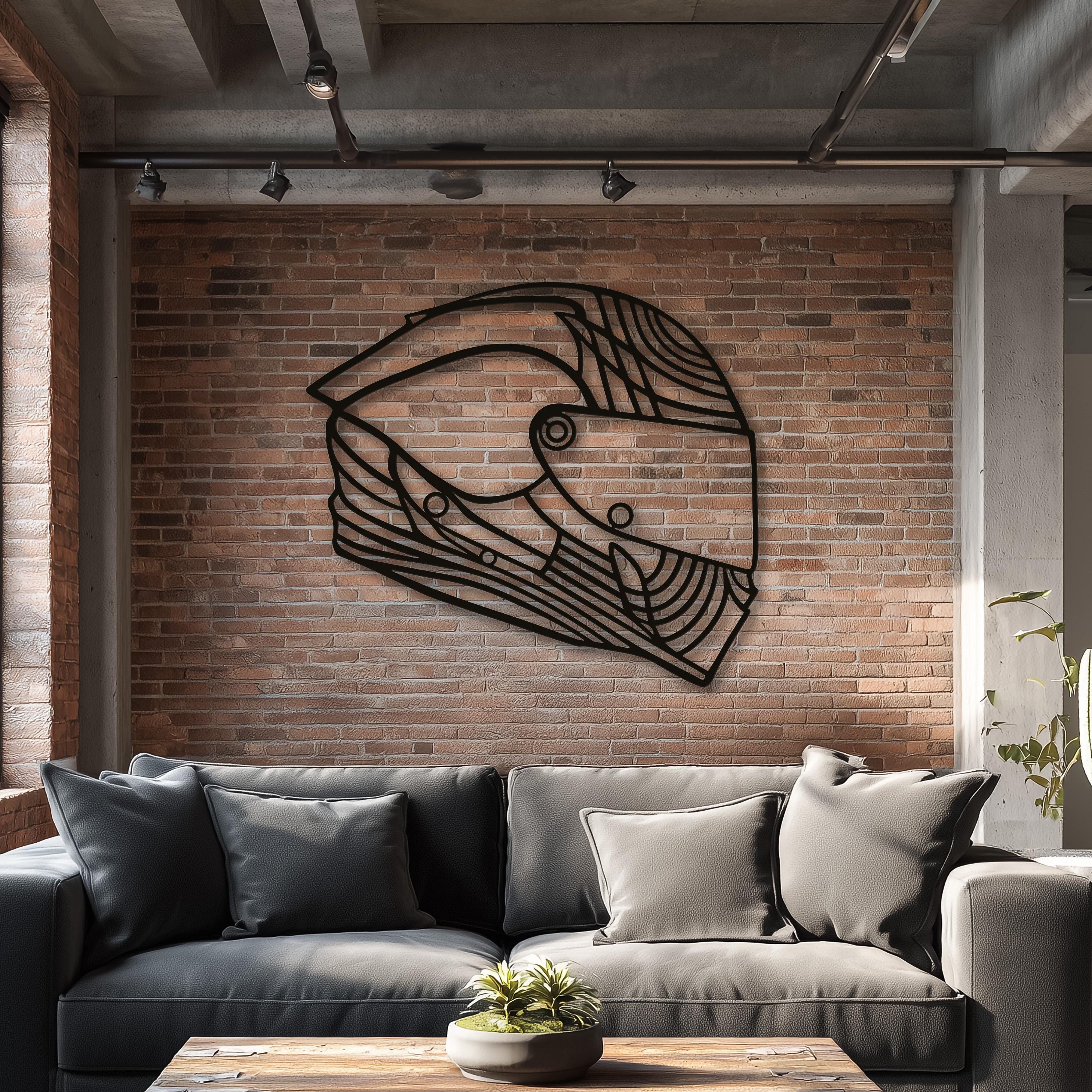 Modern loft interior with custom metal sign helmet design on exposed brick wall.