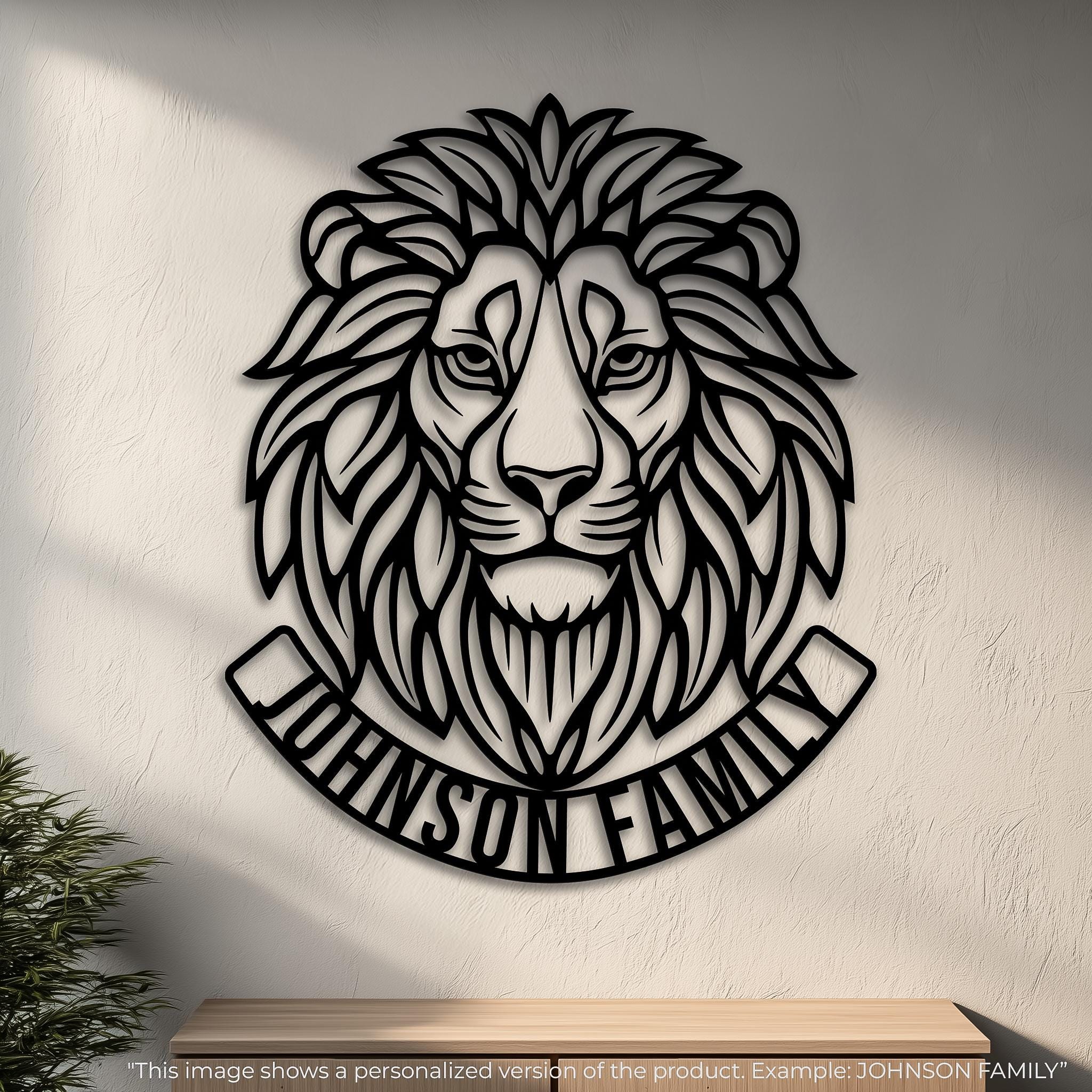 Personalized lion metal wall art with curved name bar (example: JOHNSON FAMILY). Add last name, motto, or date. CNC laser cut, matte black powder coat. Premium entryway or hallway statement piece, gift for families.