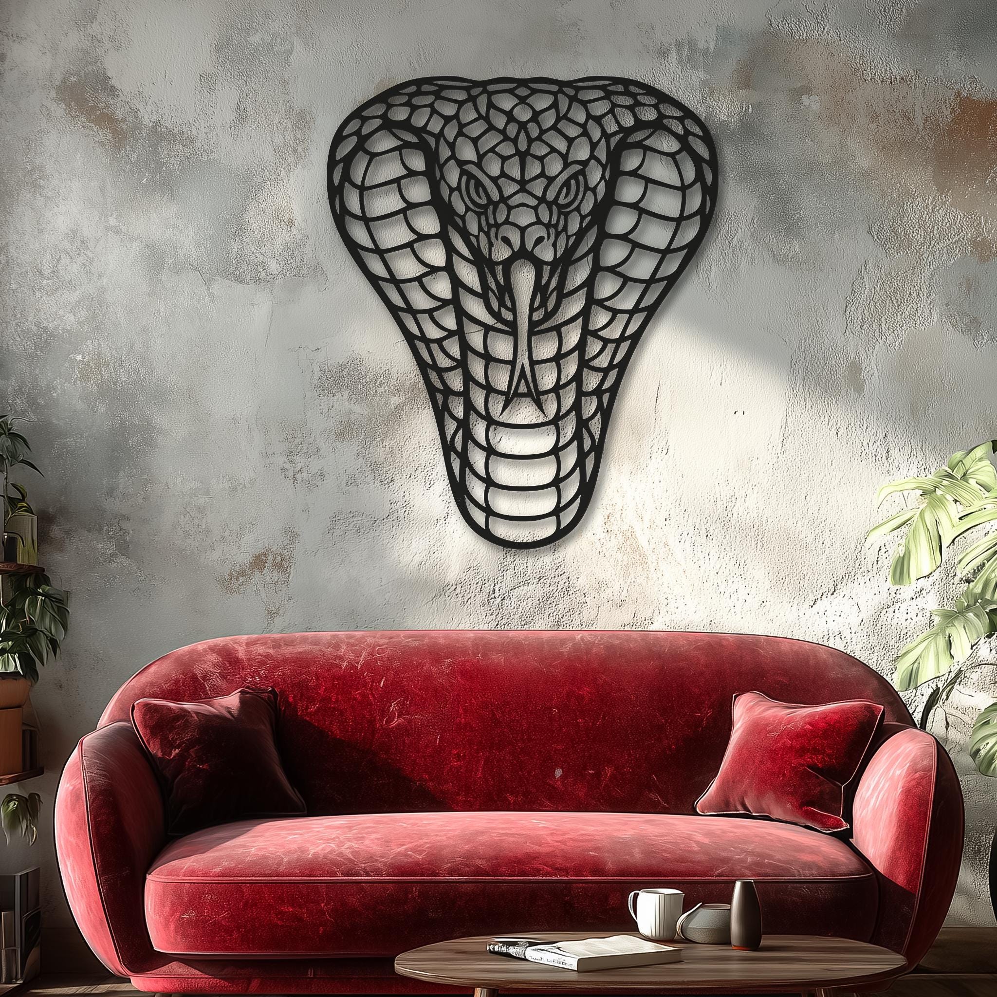 Cobra head metal wall decor above a red velvet sofa; high contrast, modern industrial-chic interior; black laser-cut steel, powder-coated; oversized statement for living room; luxury home wall sculpture; gift for men, gamers, collectors