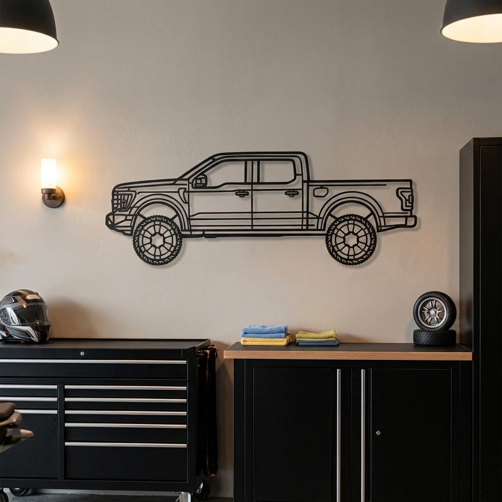 Clean pickup truck side profile metal wall art in a premium garage hero scene above tool cabinets and clean decor, matte black custom car wall decor for garage walls, office styling, man cave interiors, car guy gifts, and vehicle art displays.