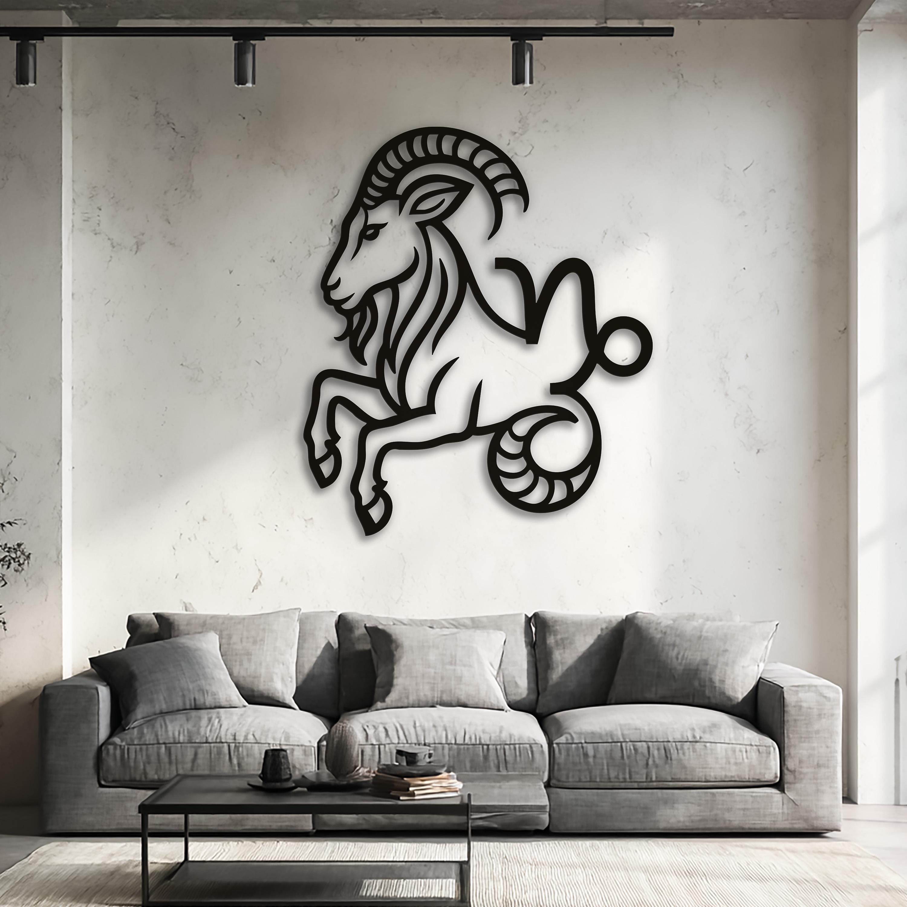 Capricorn zodiac CNC laser-cut black metal wall art with dramatic sunlight and shadow, modern minimalist home wall decor.