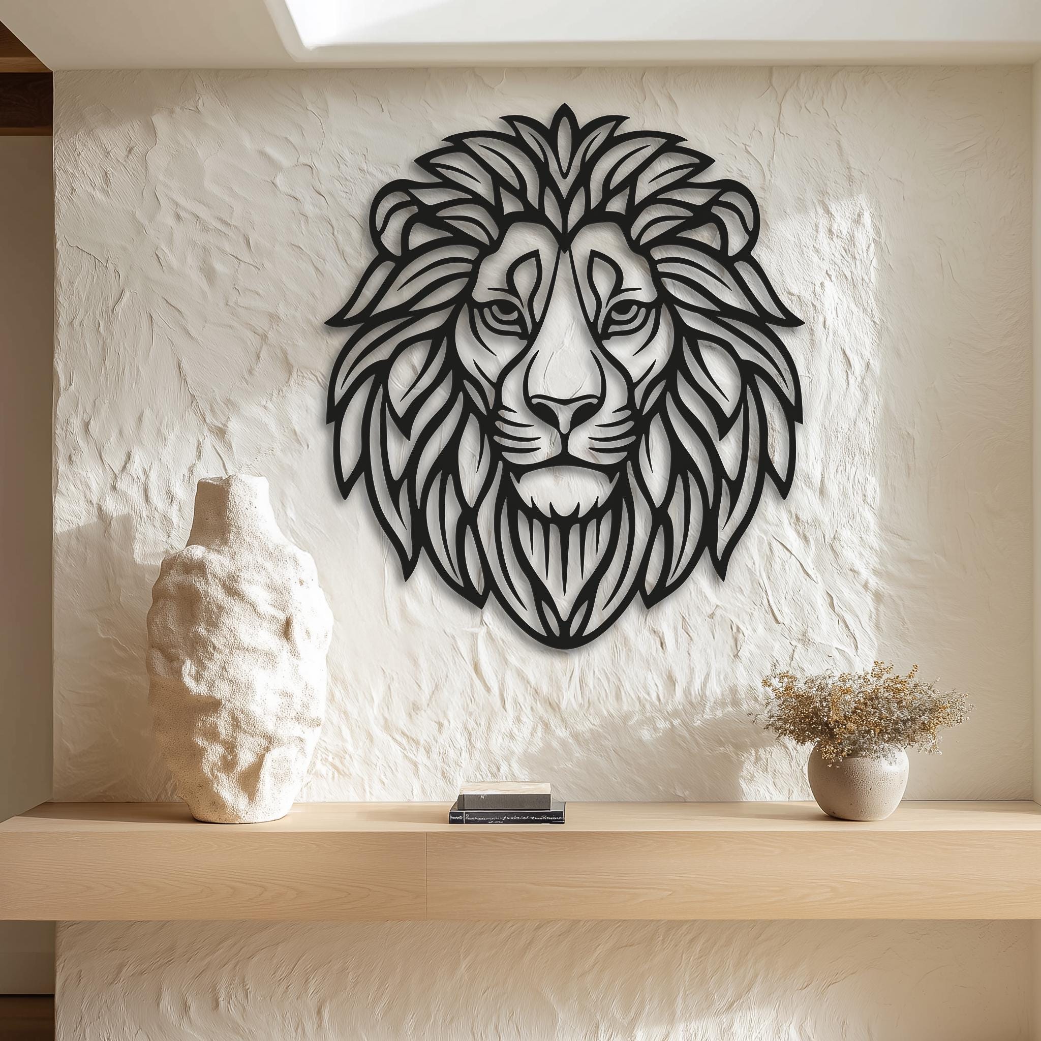 Lion head metal wall art, CNC laser cut, matte black finish. Bold line art on bright white textured wall for high contrast. Modern living room decor, entryway statement, large size options, gift for men, housewarming, safari/jungle theme.