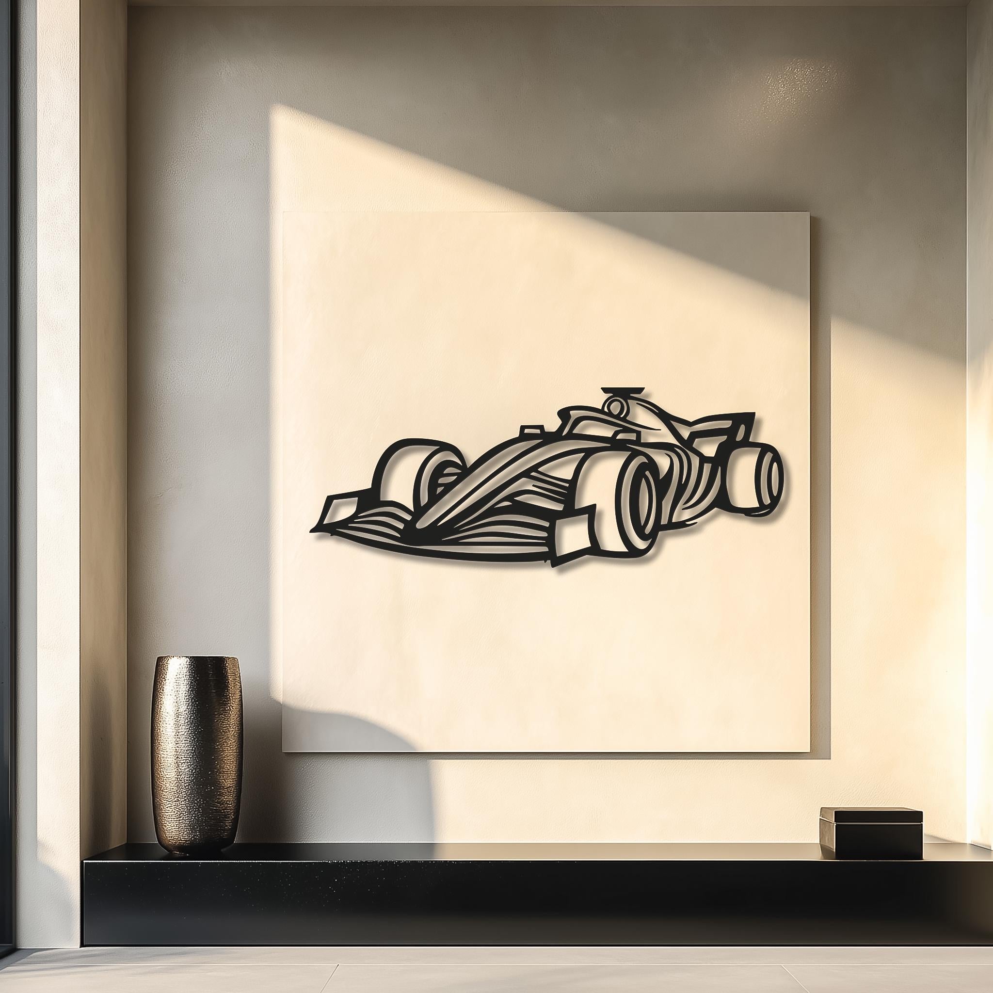 Matte-black CNC race car wall art on a concrete wall between two console tables. Modern industrial interior, clear silhouette and 3D shadow. Open-wheel motorsports décor; multiple sizes; optional personalization (name, number, date); ready to mount.
