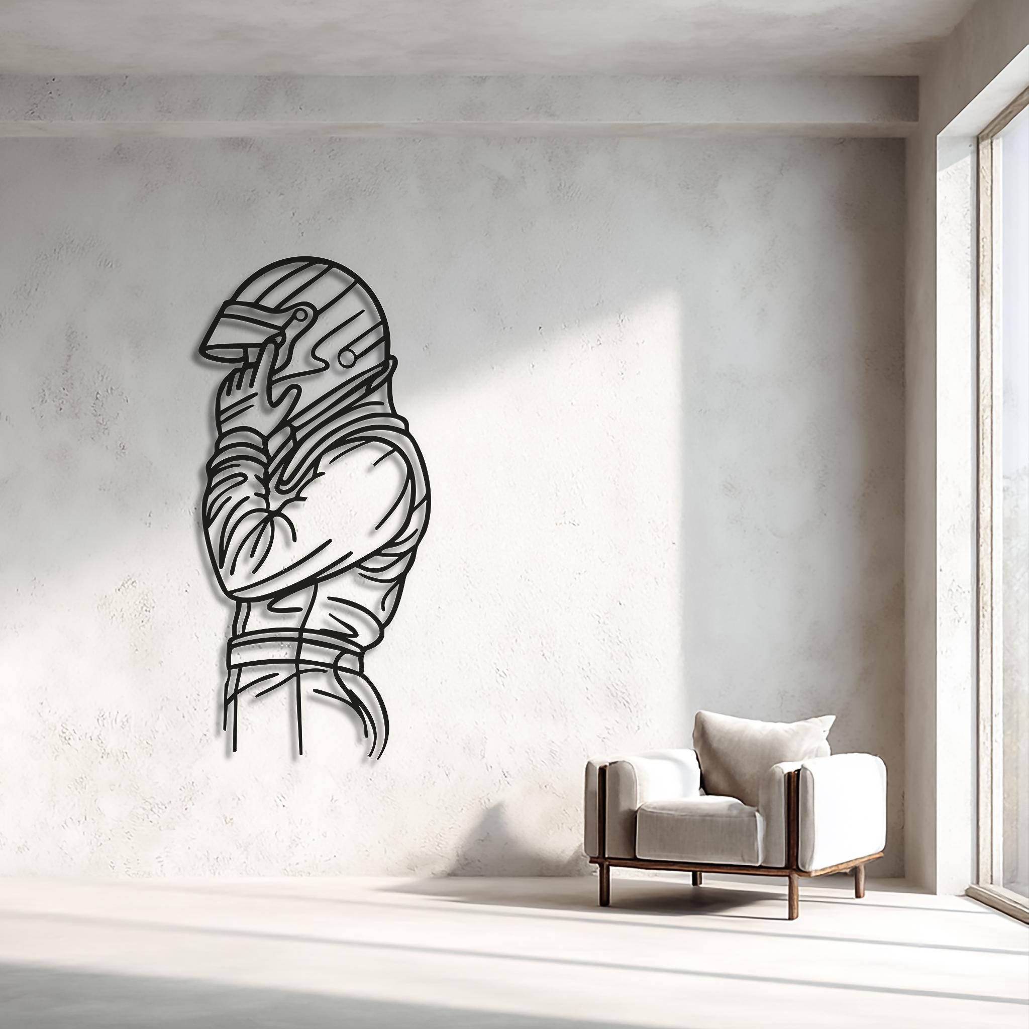 Minimal bright wall with CNC laser-cut racing driver silhouette, matte black. Sleeve text customizable. Clean motorsports décor for apartment, studio or office; available in multiple sizes; ready to hang.