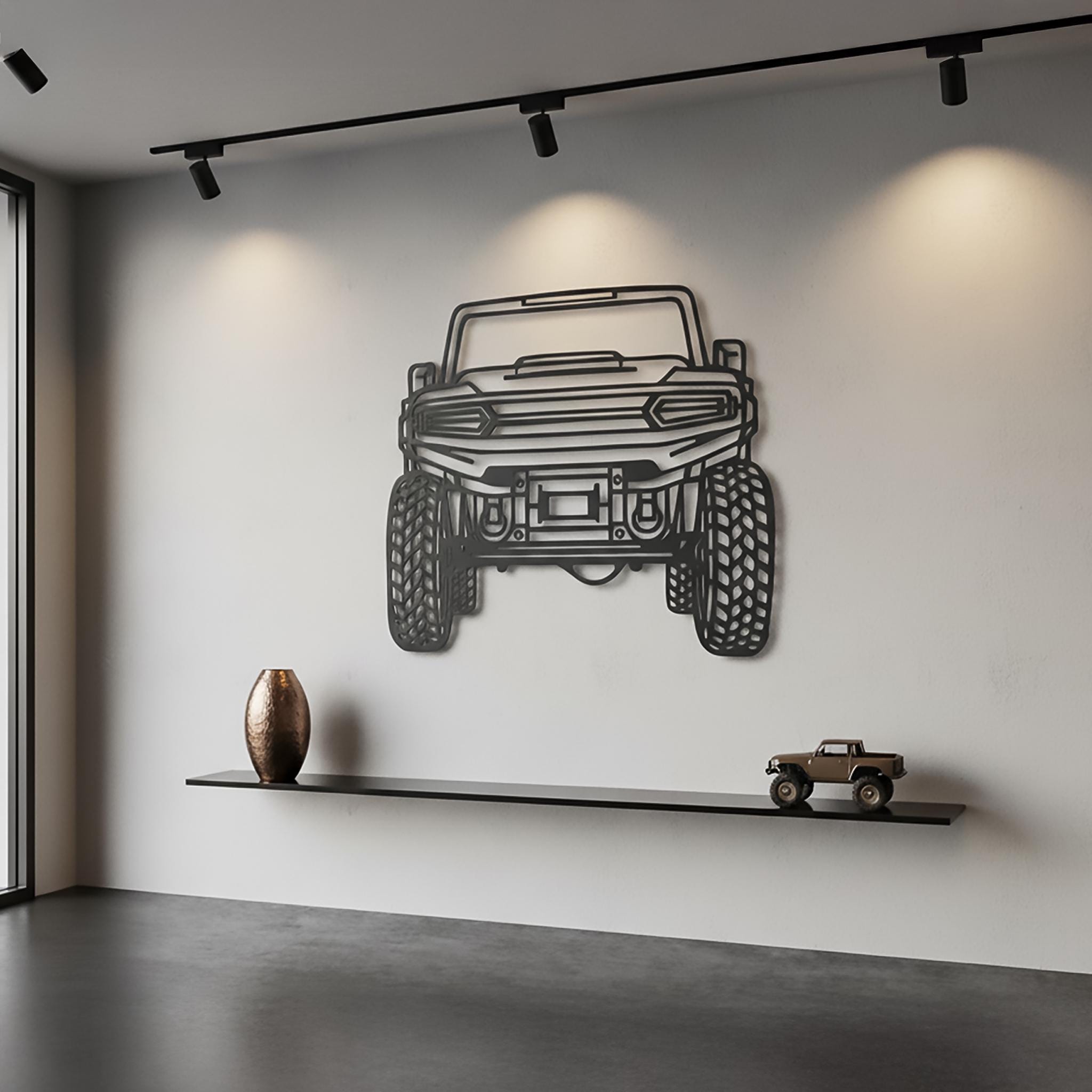 Off-road 4×4 custom metal wall art, front outline, matte-black powder-coated CNC cut. Track-light display, bold tire and grille details. Personalized from photo with text/plate. Garage or man-cave décor.