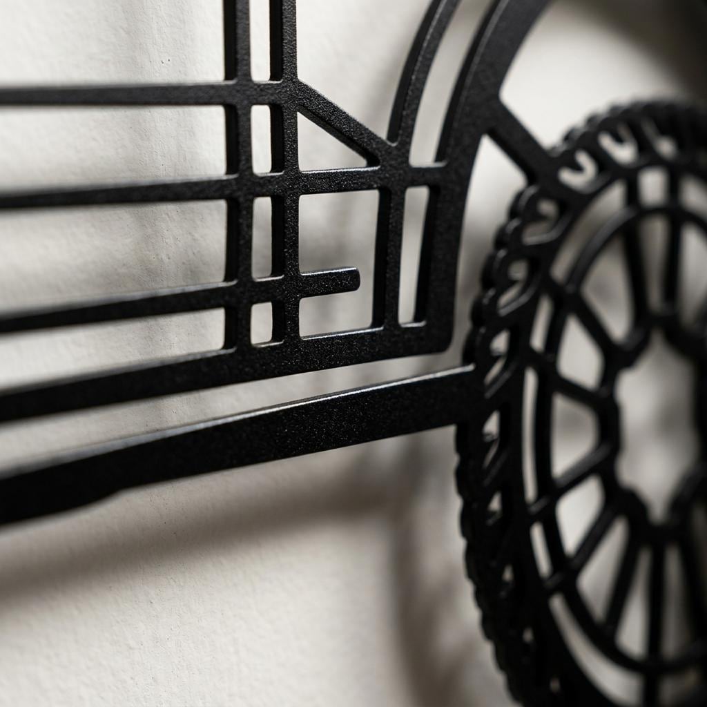 May include: A black metal wall art piece featuring a cutout silhouette of a vehicle. The design includes a grid-like frame structure and a detailed wheel with spokes, showcasing a matte finish and clean, precise laser-cut edges throughout.